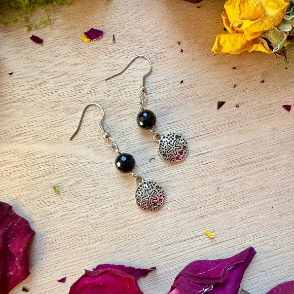 Faceted Black Onyx Earrings with Sand Dollar Charms - Picture 3 of 3